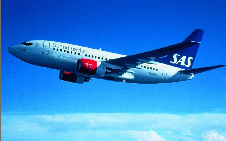 ���\����